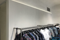 fluted-mdf-feature-with-recessed-lighting