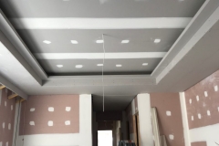 Installation of custom plasterboard profiles for ceiling coffer