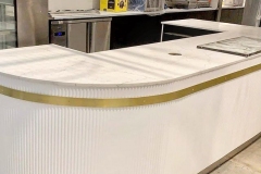 Ribbed MDF curved island bench