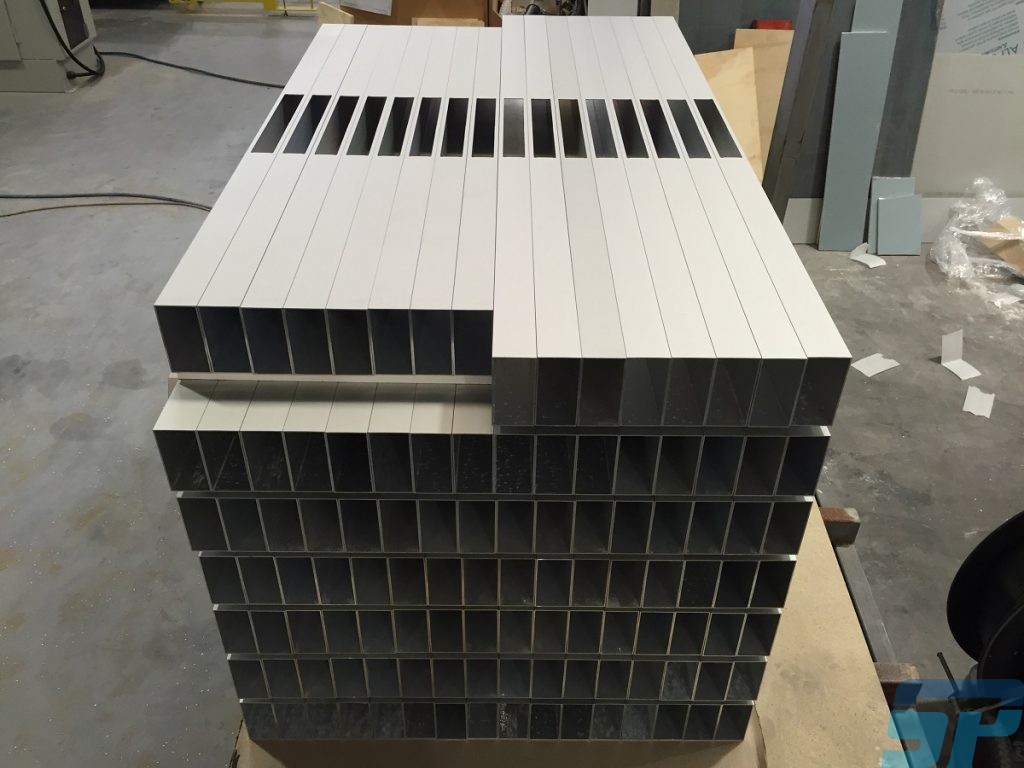 Light holes cut into Aluminium RHS